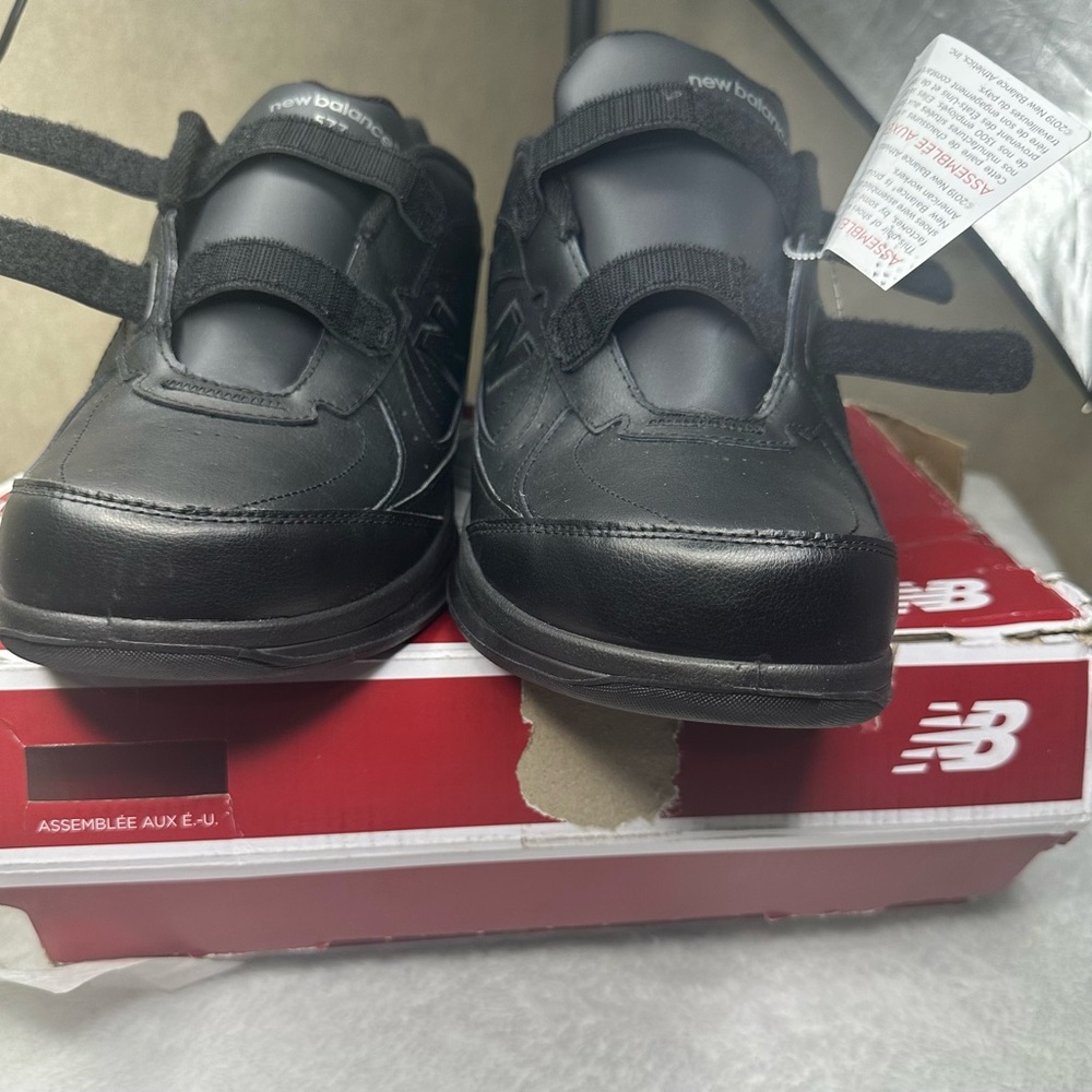 New Balance Black Sneakers with Velcro Straps and Supportive Sole